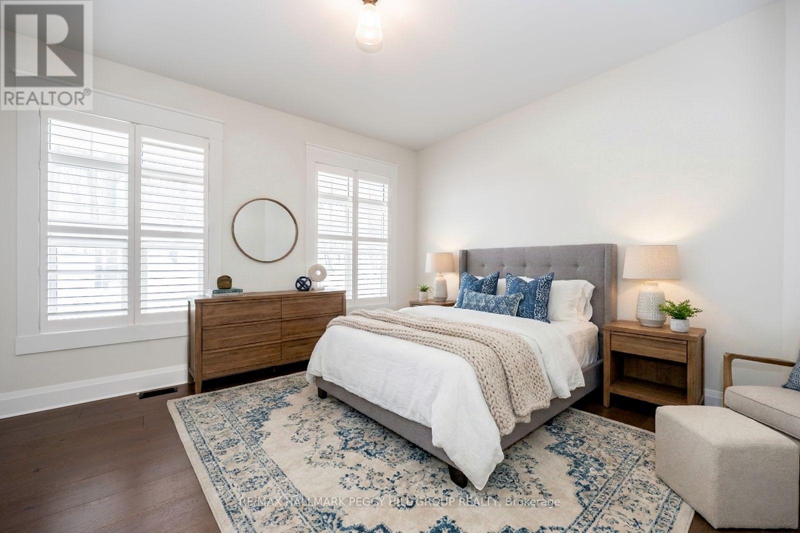 16 Heron Boulevard, Springwater, ON - Indoor Photo Showing Bedroom