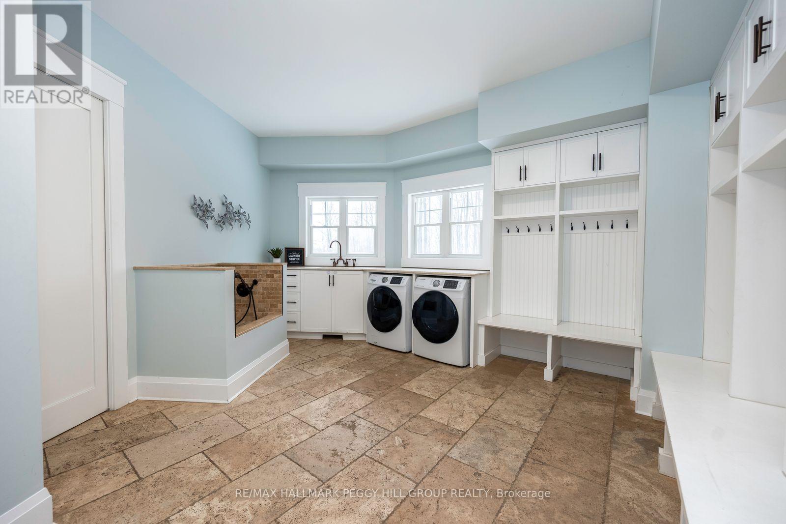 16 Heron Boulevard, Springwater, ON - Indoor Photo Showing Laundry Room