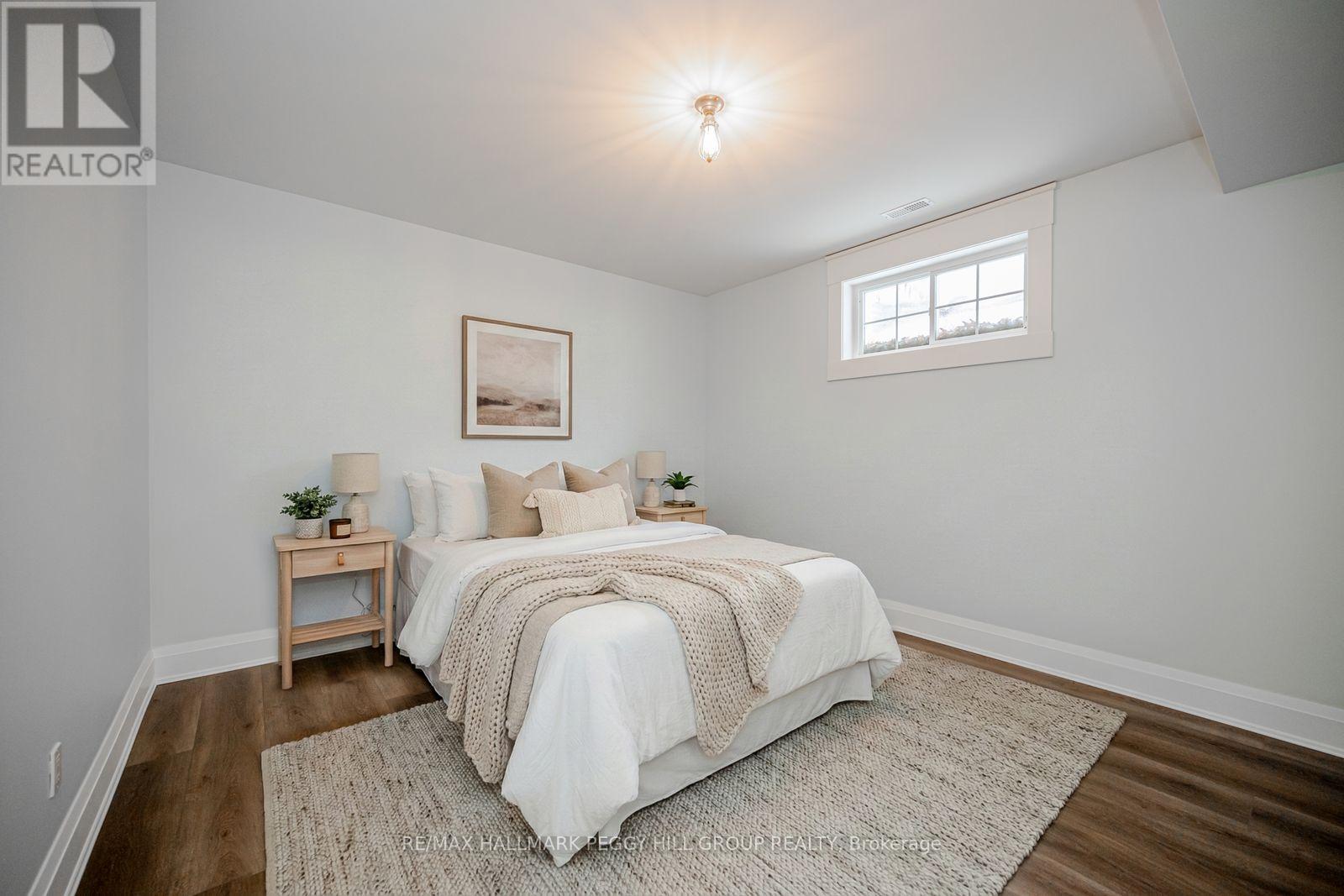 16 Heron Boulevard, Springwater, ON - Indoor Photo Showing Bedroom