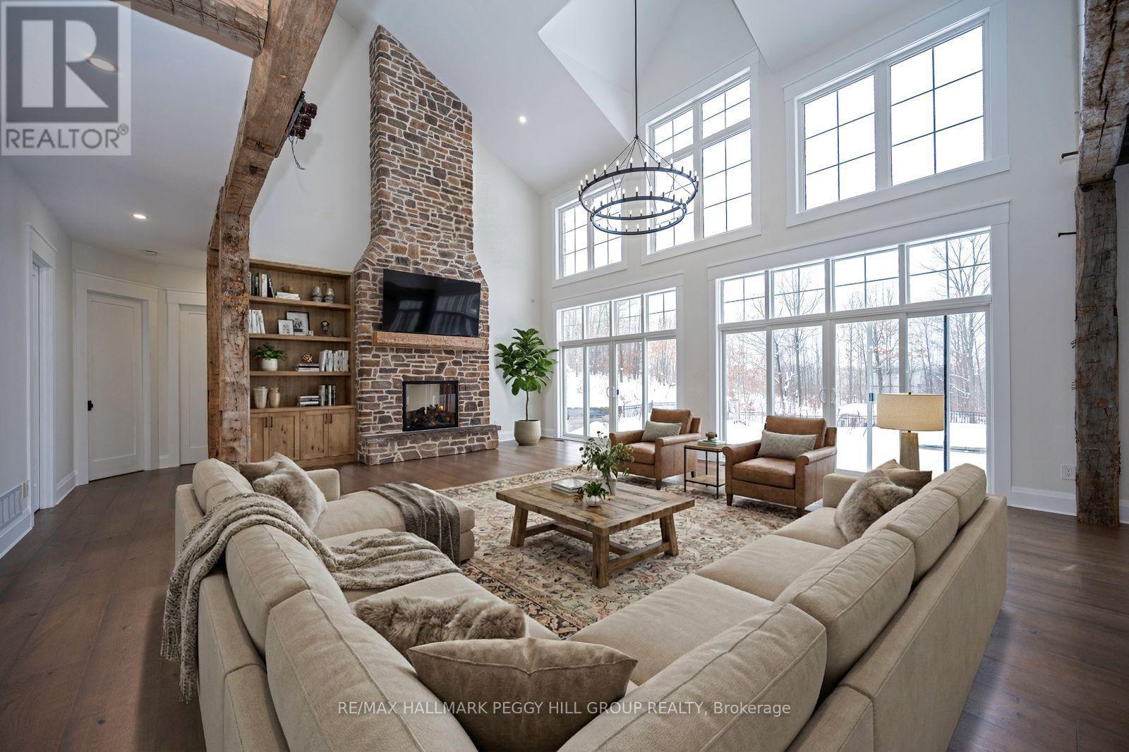 16 Heron Boulevard, Springwater, ON - Indoor Photo Showing Living Room With Fireplace