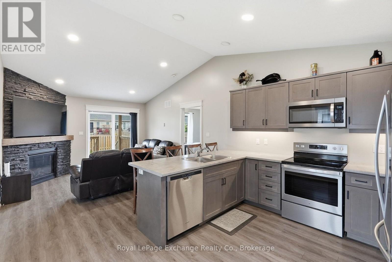 241 Eccles Avenue, West Grey, ON - Indoor Photo Showing Kitchen With Fireplace With Double Sink