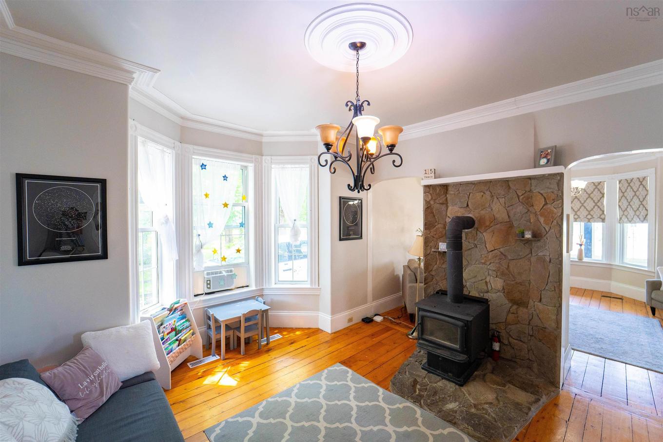 42 Victoria Street, Amherst, NS - Indoor Photo Showing Living Room With Fireplace
