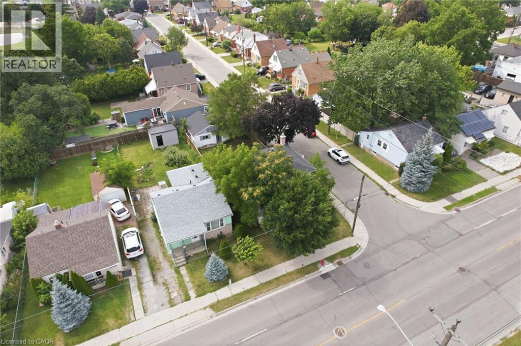 Aerial perspective showcasing multiple properties, residential streets, and mature trees - 432 Upper Sherman Avenue, Hamilton, ON - Outdoor With View