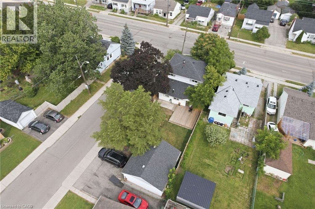 Aerial perspective of a property featuring a light-colored exterior and a gray shingled roof - 432 Upper Sherman Avenue, Hamilton, ON - Outdoor With View