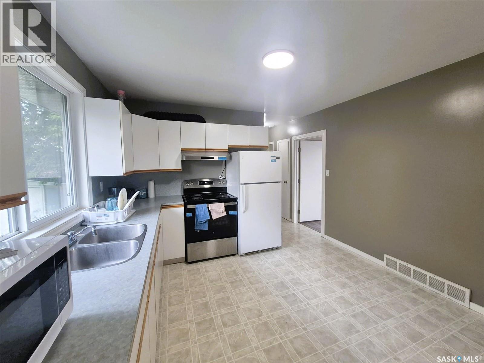 161 Darlington Street E, Yorkton, SK - Indoor Photo Showing Kitchen With Double Sink