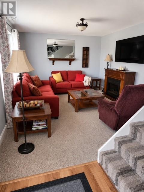 10 Bayview Lane, Lawn, NL - Indoor Photo Showing Living Room With Fireplace