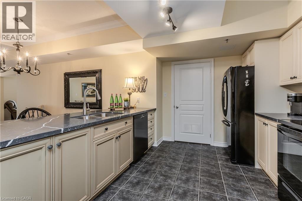 391 Plains Road E Unit# 412, Burlington, ON - Indoor Photo Showing Kitchen With Double Sink