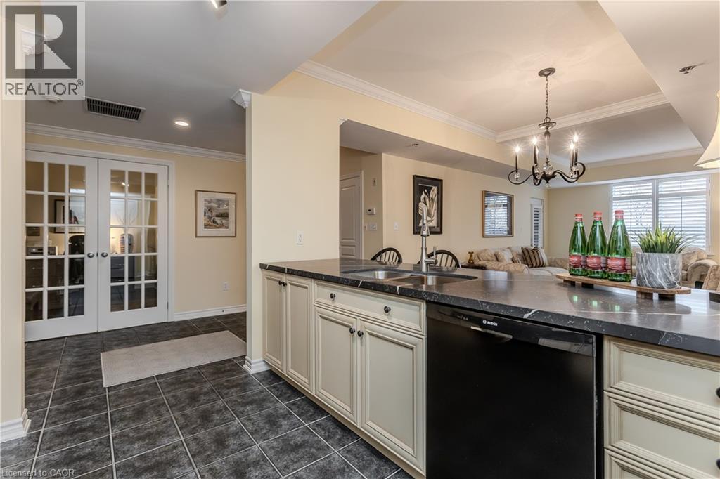 391 Plains Road E Unit# 412, Burlington, ON - Indoor Photo Showing Kitchen With Double Sink