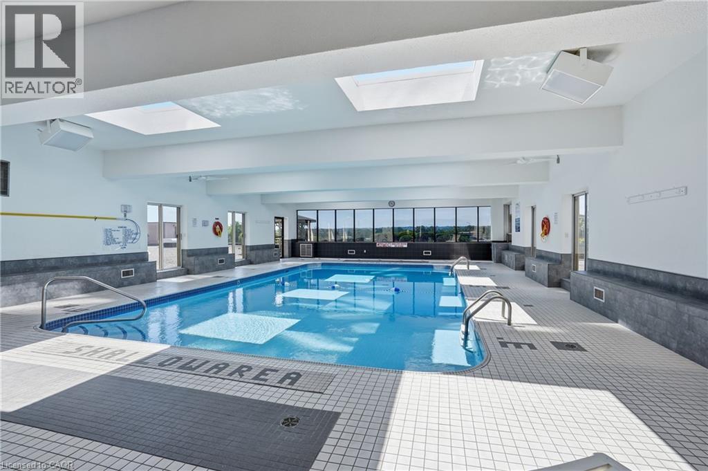 7 Gale Crescent Unit# B3, St. Catharines, ON - Indoor Photo Showing Other Room With In Ground Pool