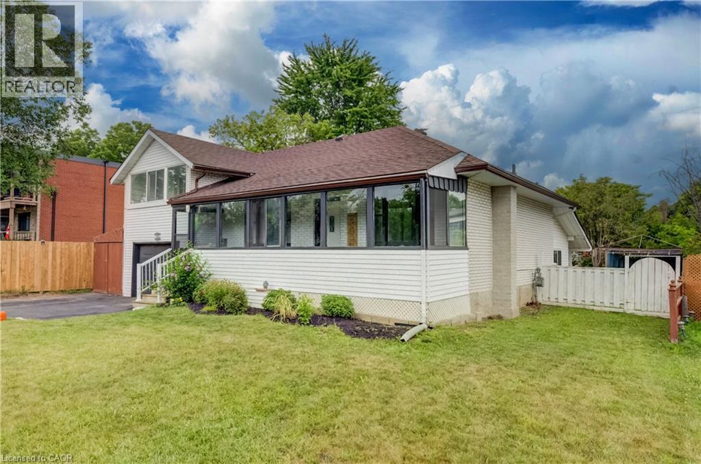 White siding exterior with a brown shingle roof - 182 Avalon Place, Kitchener, ON - Outdoor