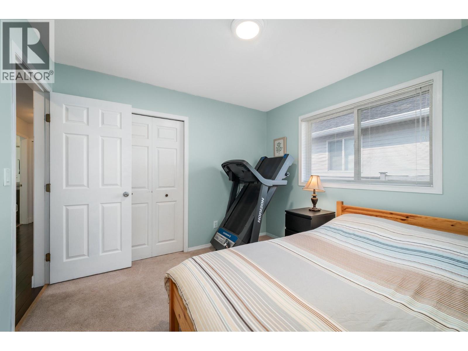 110 Wyndham Crescent, Kelowna, BC - Indoor Photo Showing Bedroom