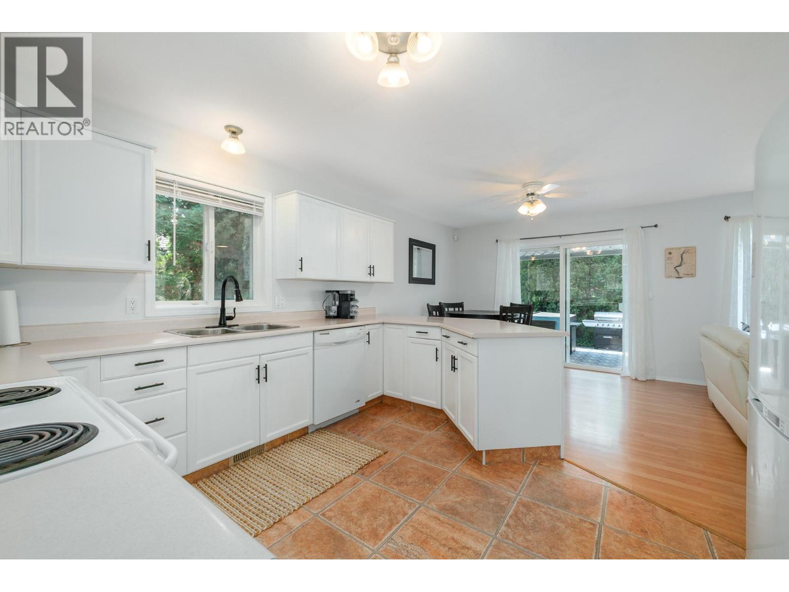 110 Wyndham Crescent, Kelowna, BC - Indoor Photo Showing Kitchen With Double Sink