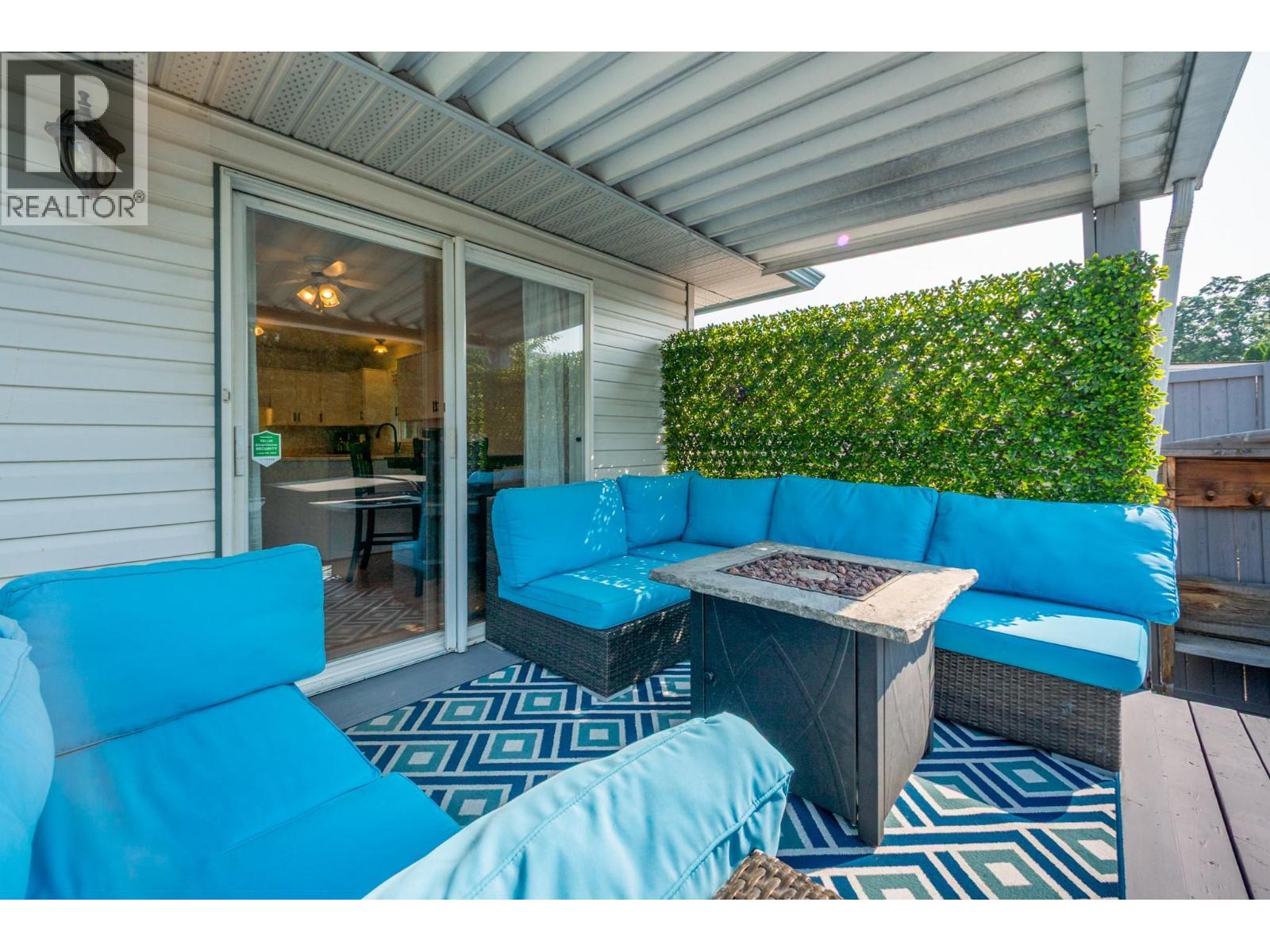 110 Wyndham Crescent, Kelowna, BC - Outdoor With Deck Patio Veranda With Exterior