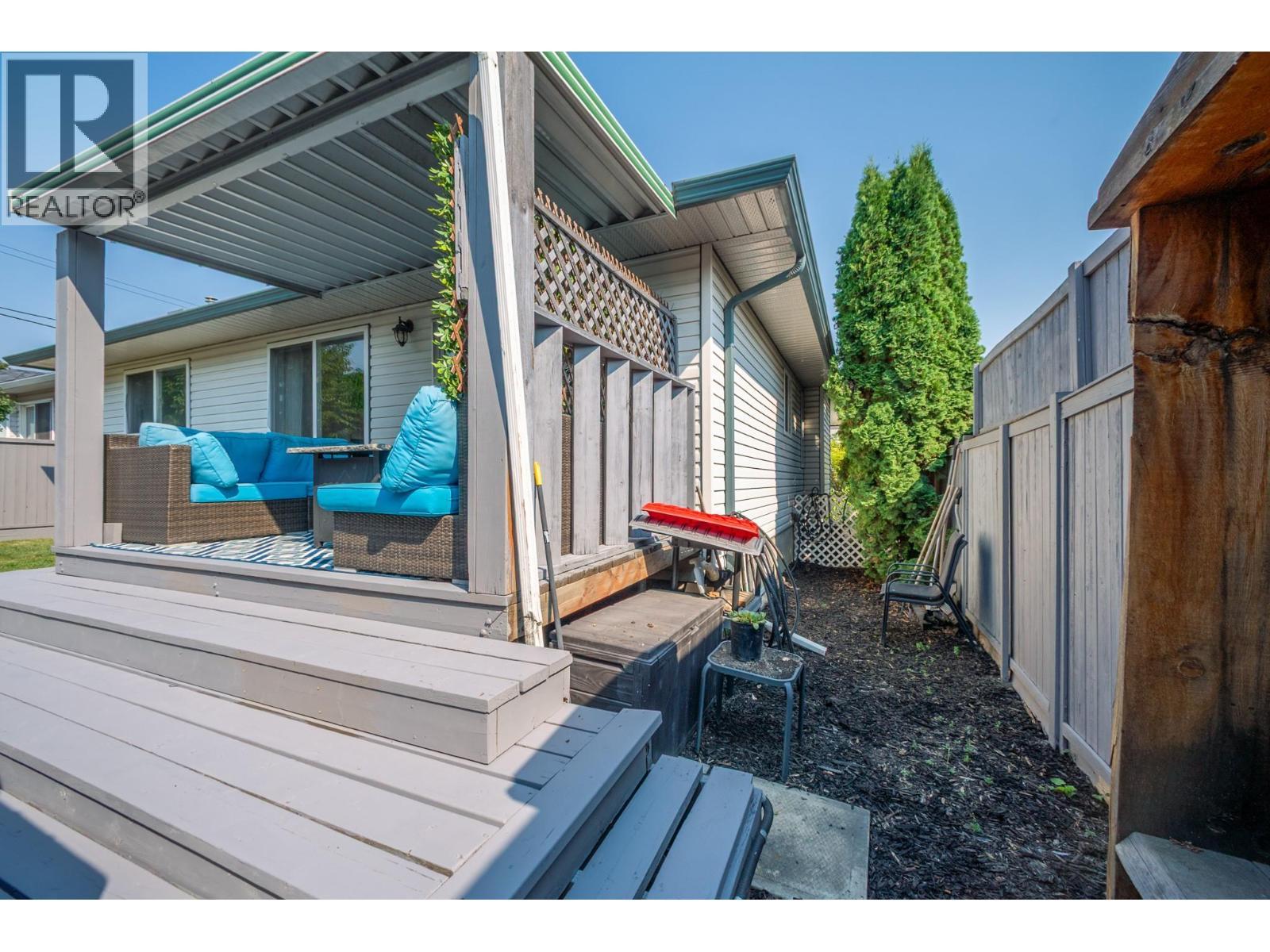 110 Wyndham Crescent, Kelowna, BC - Outdoor With Deck Patio Veranda With Exterior