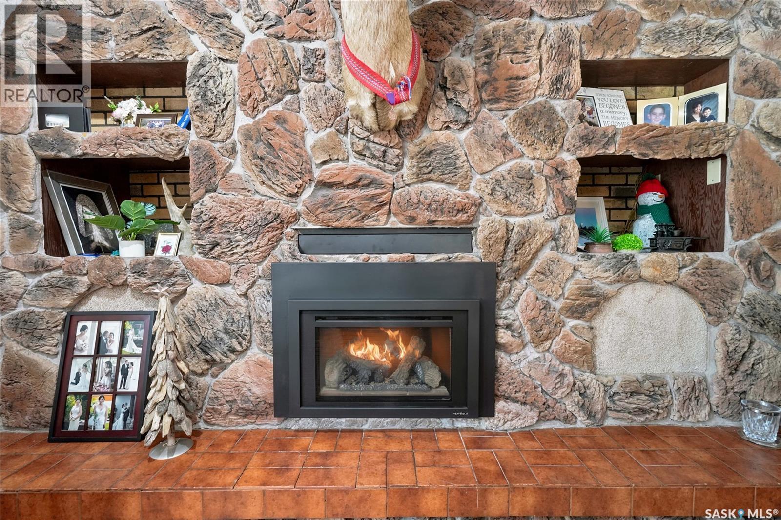 4 Pine Street, Katepwa Beach, SK - Indoor Photo Showing Living Room With Fireplace