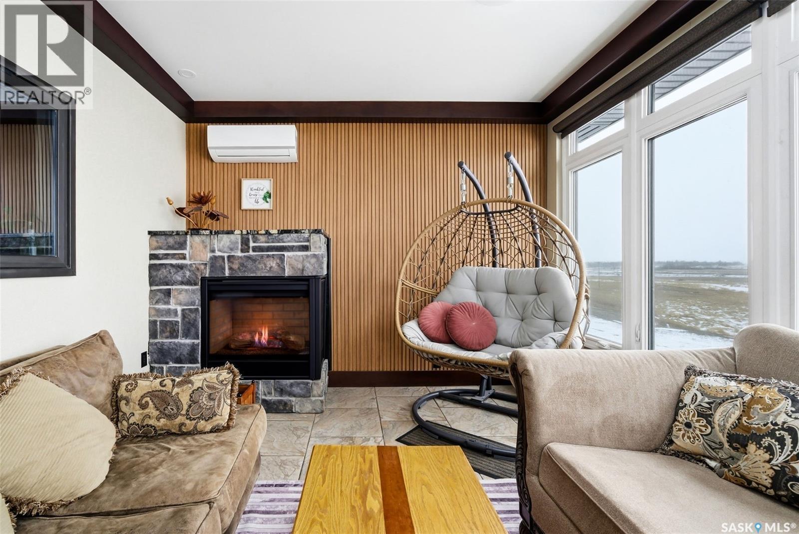 7502 Lilac Place, Regina, SK - Indoor Photo Showing Living Room With Fireplace