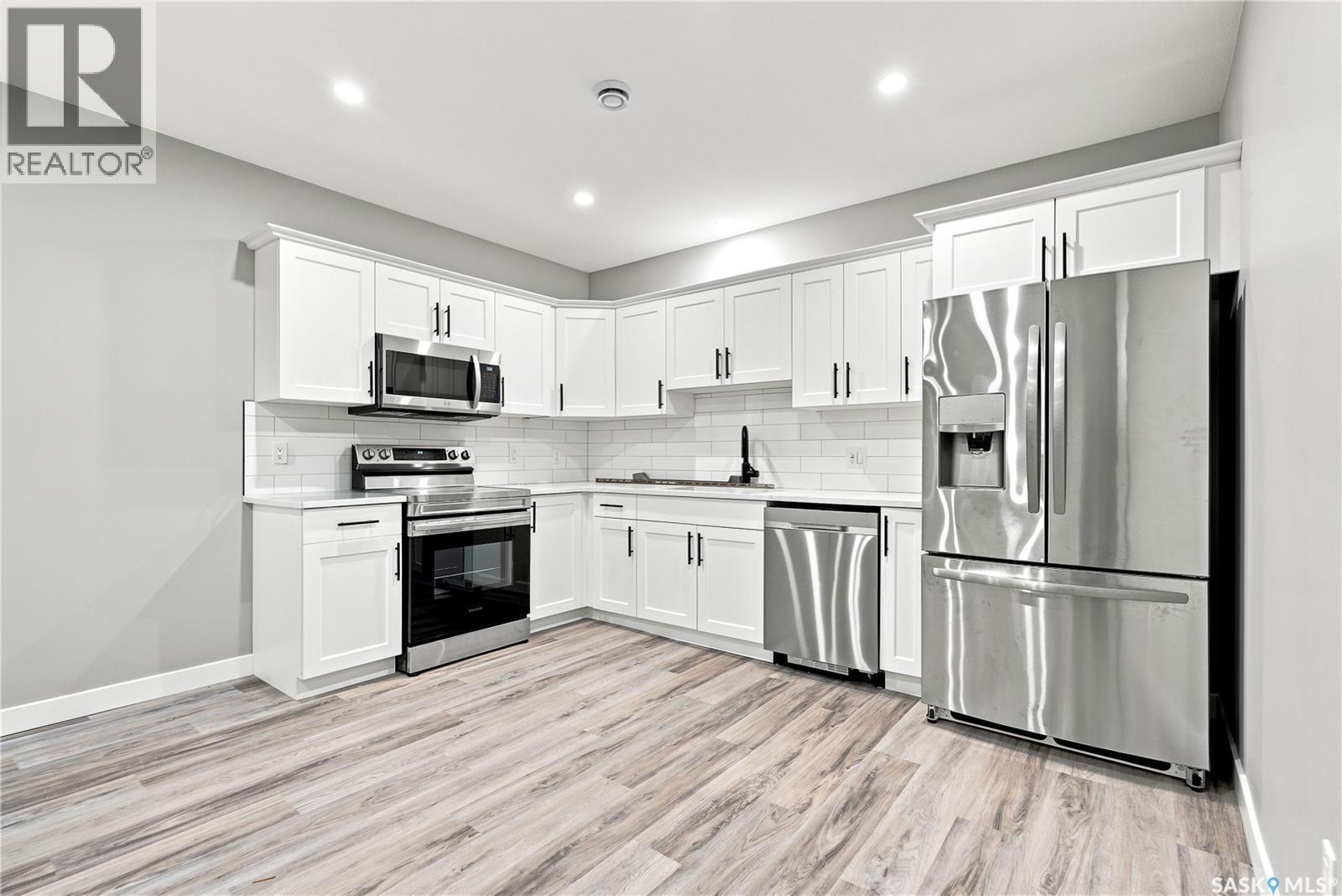 247 Thakur Street, Saskatoon, SK - Indoor Photo Showing Kitchen With Stainless Steel Kitchen With Upgraded Kitchen