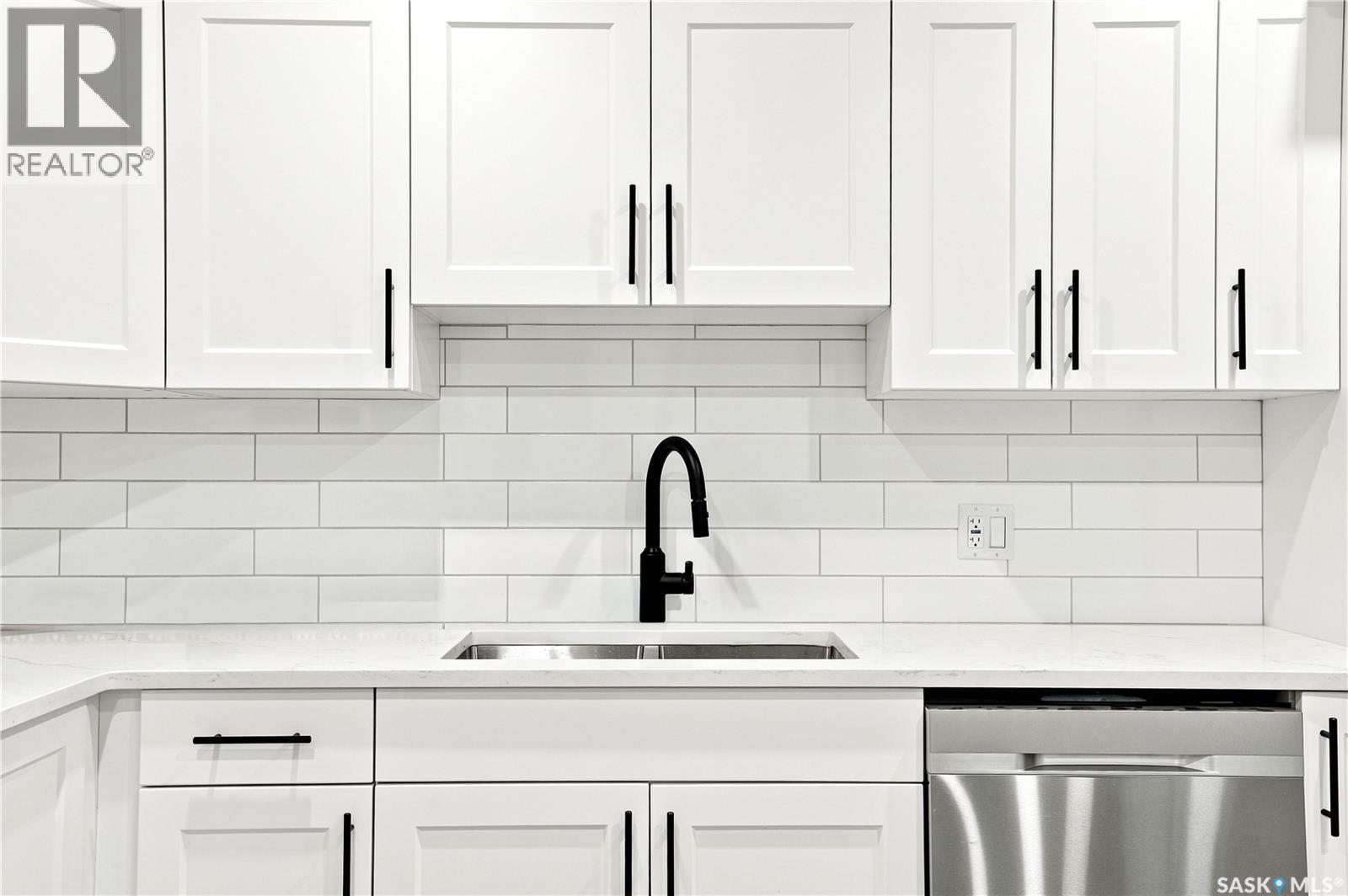247 Thakur Street, Saskatoon, SK - Indoor Photo Showing Kitchen With Double Sink With Upgraded Kitchen