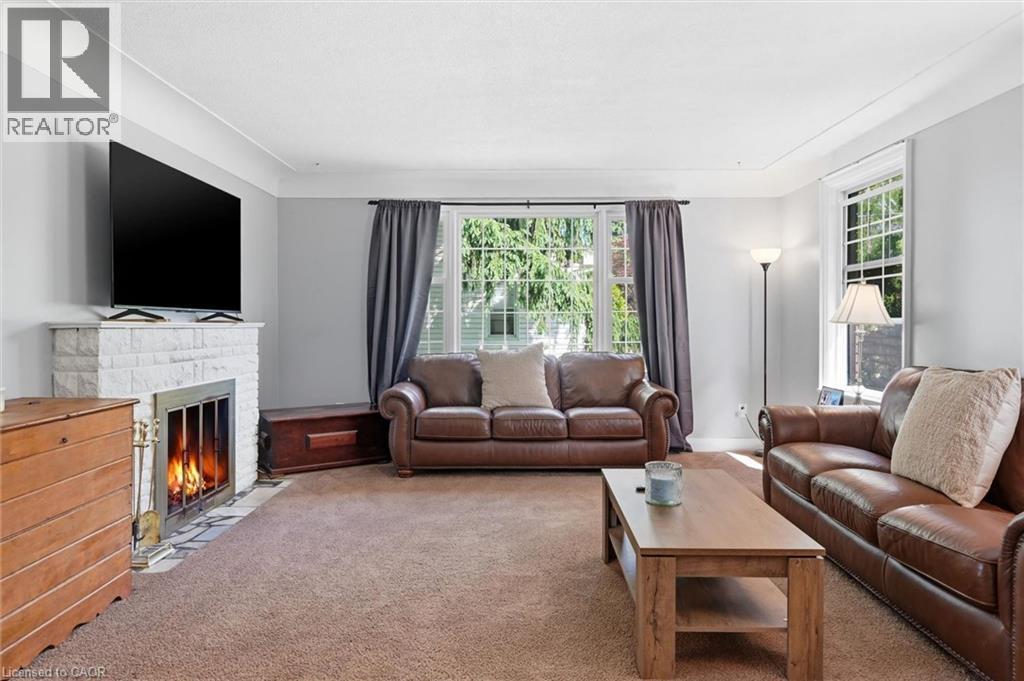938 Cloverleaf Drive, Burlington, ON - Indoor Photo Showing Living Room With Fireplace