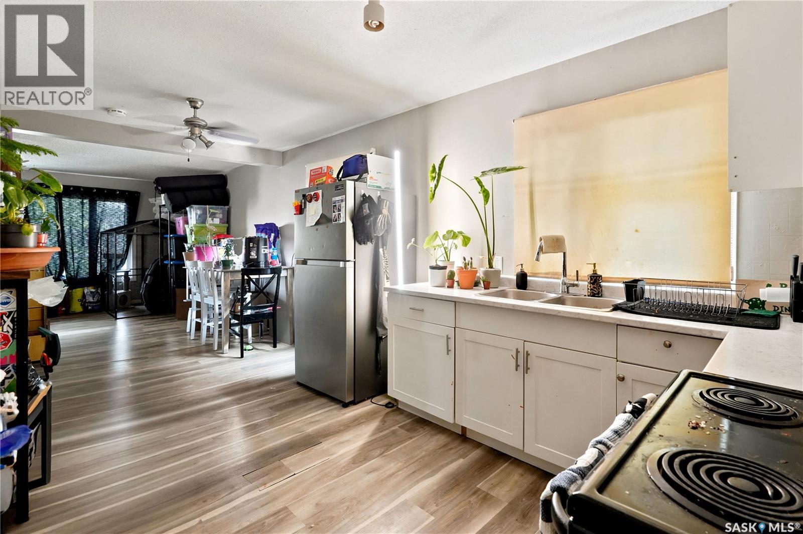 2232 Mcara Street, Regina, SK - Indoor Photo Showing Kitchen With Double Sink