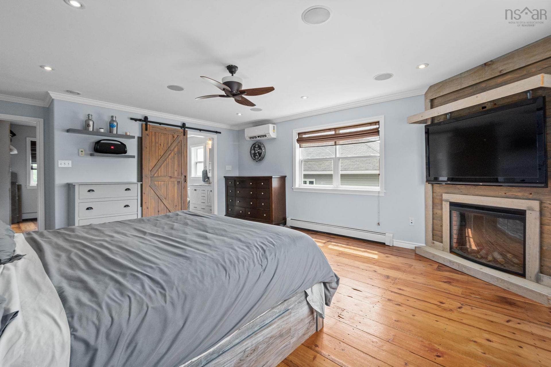 37 Pearl Drive, Colby, NS - Indoor Photo Showing Bedroom With Fireplace