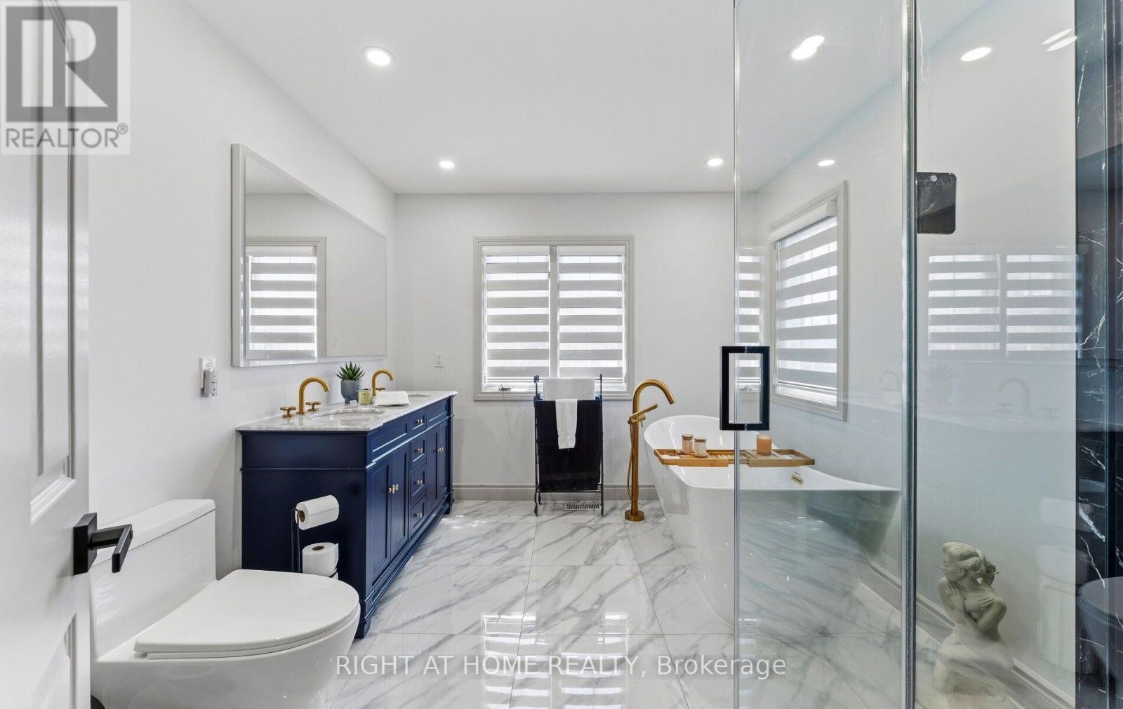 Spa-inspired 5-piece ensuite with natural light. - 1665 Asgard Drive, Mississauga, ON - Outdoor