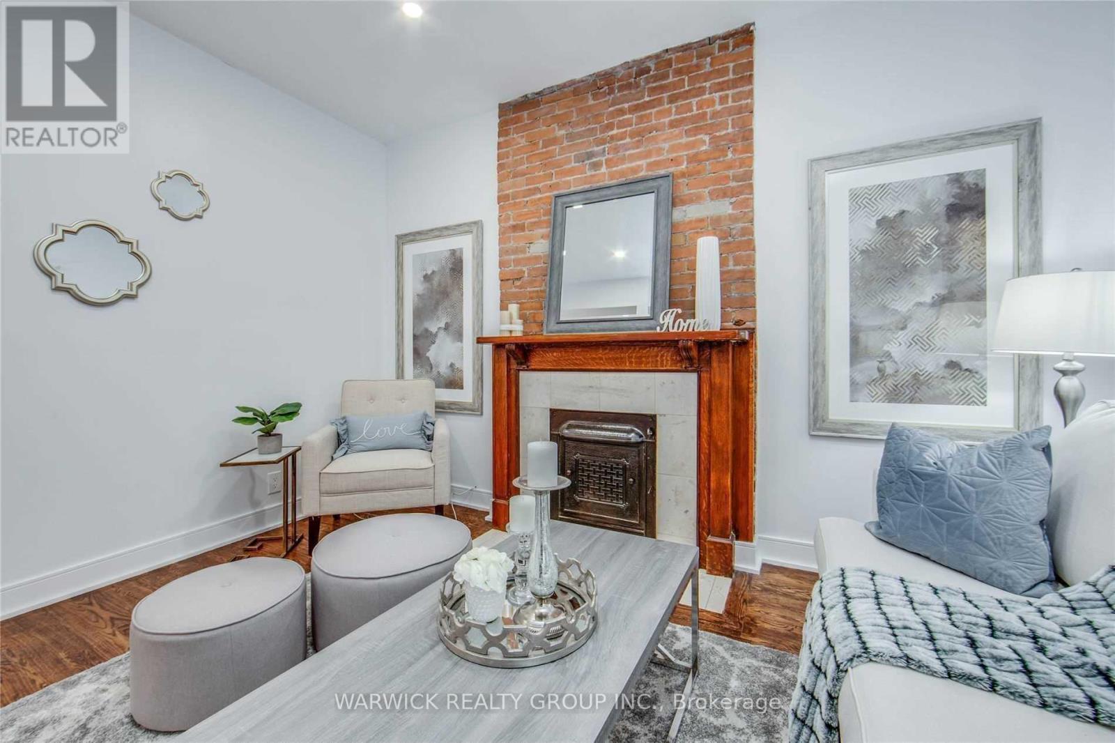 Lower - 57 Bertmount Avenue, Toronto, ON - Indoor Photo Showing Living Room With Fireplace