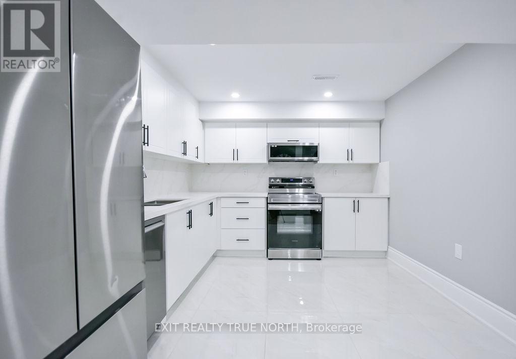 108 Rugman Crescent, Springwater, ON - Indoor Photo Showing Kitchen