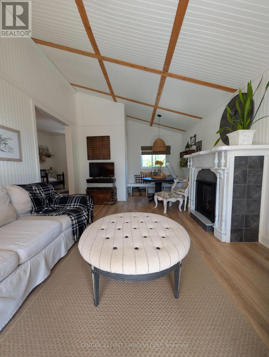 28- 79681 Bluewater Highway, Central Huron (Goderich), ON - Indoor Photo Showing Living Room With Fireplace