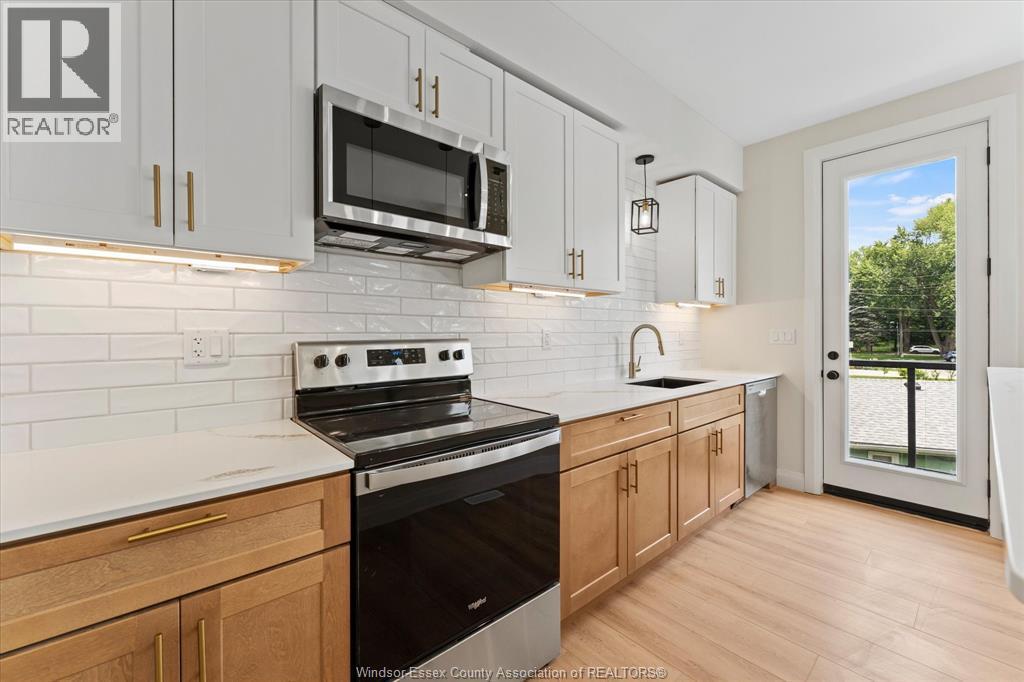 150 Old Front Unit# Front-Upper, Lasalle, ON - Indoor Photo Showing Kitchen With Stainless Steel Kitchen With Upgraded Kitchen