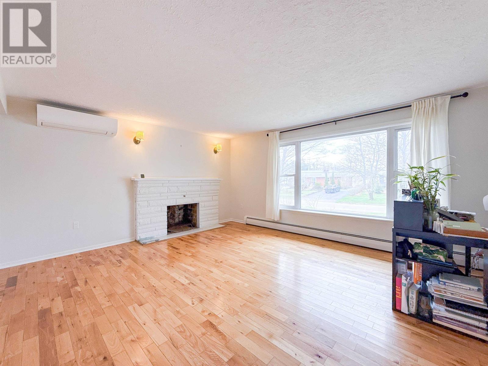 47 Emerald Drive, Charlottetown, PE - Indoor Photo Showing Living Room With Fireplace
