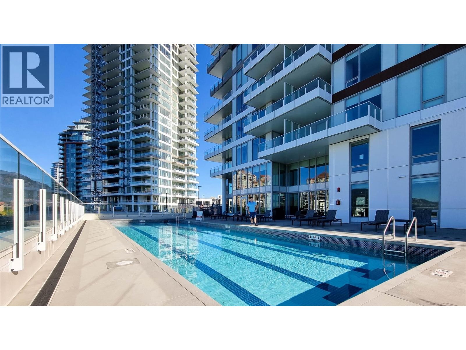 Adult Pool - 1191 Sunset Drive Unit# 609, Kelowna, BC - Outdoor With In Ground Pool With Facade