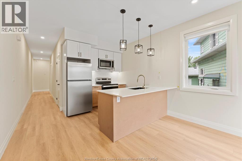 150 Old Front Unit# Main, Lasalle, ON - Indoor Photo Showing Kitchen With Stainless Steel Kitchen With Upgraded Kitchen