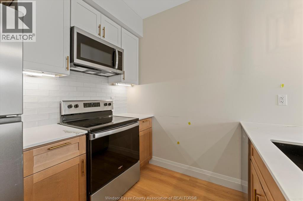 150 Old Front Unit# Main, Lasalle, ON - Indoor Photo Showing Kitchen With Stainless Steel Kitchen
