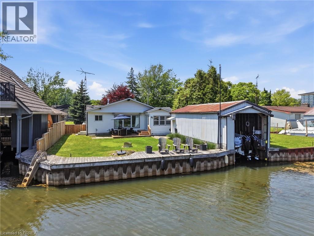 382 Cedar Drive, Turkey Point, ON - Outdoor With Body Of Water