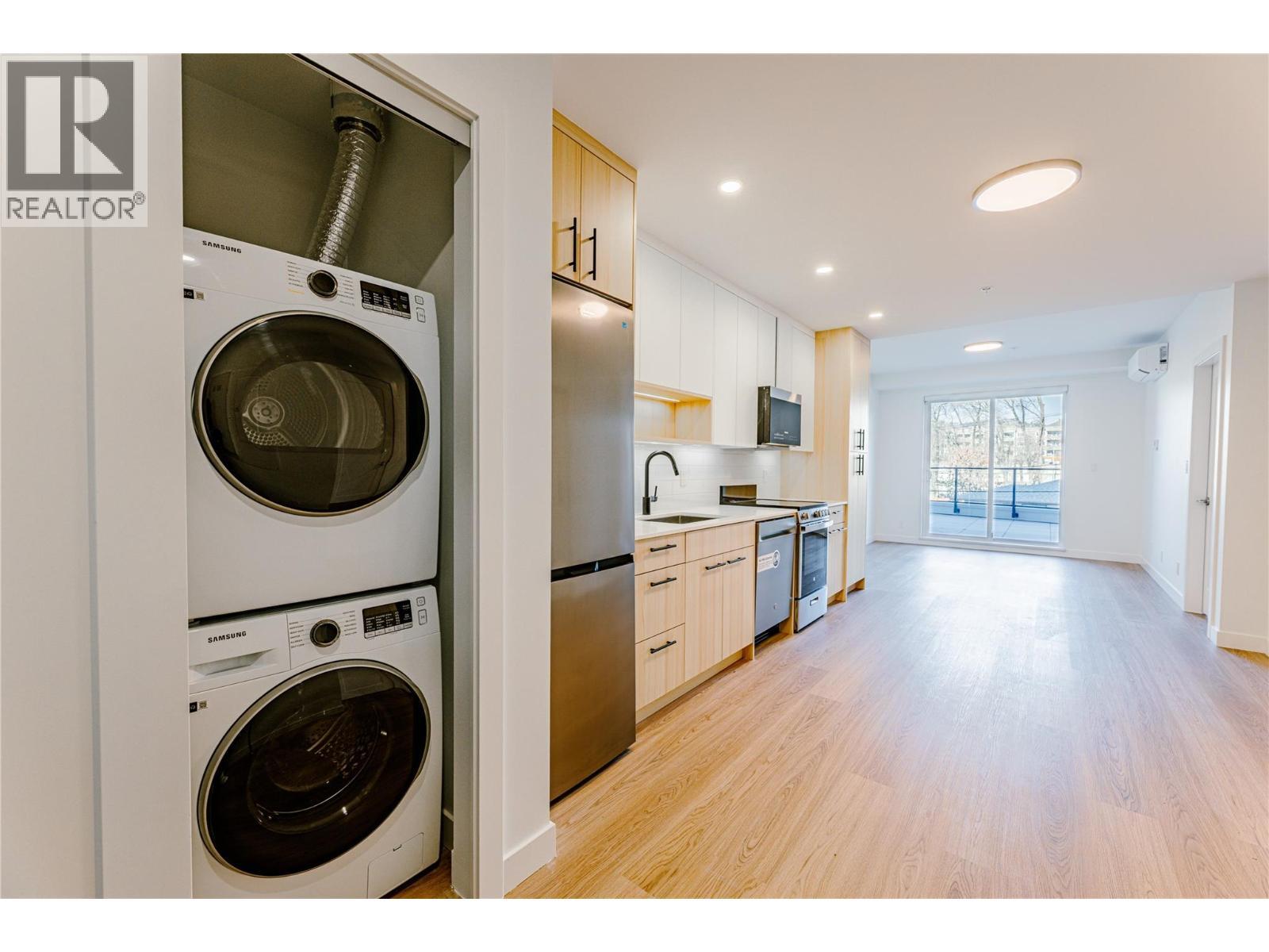 Photo from similar unit. - 1380 Pridham Avenue Unit# 314, Kelowna, BC - Indoor Photo Showing Laundry Room