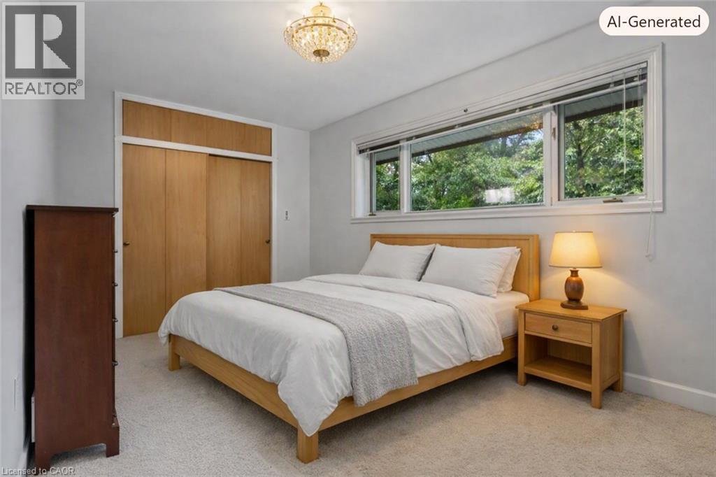 Virtually staged bedroom featuring light-colored carpeting and white walls - 44 Colquhoun Crescent, Hamilton, ON - Indoor Photo Showing Bedroom