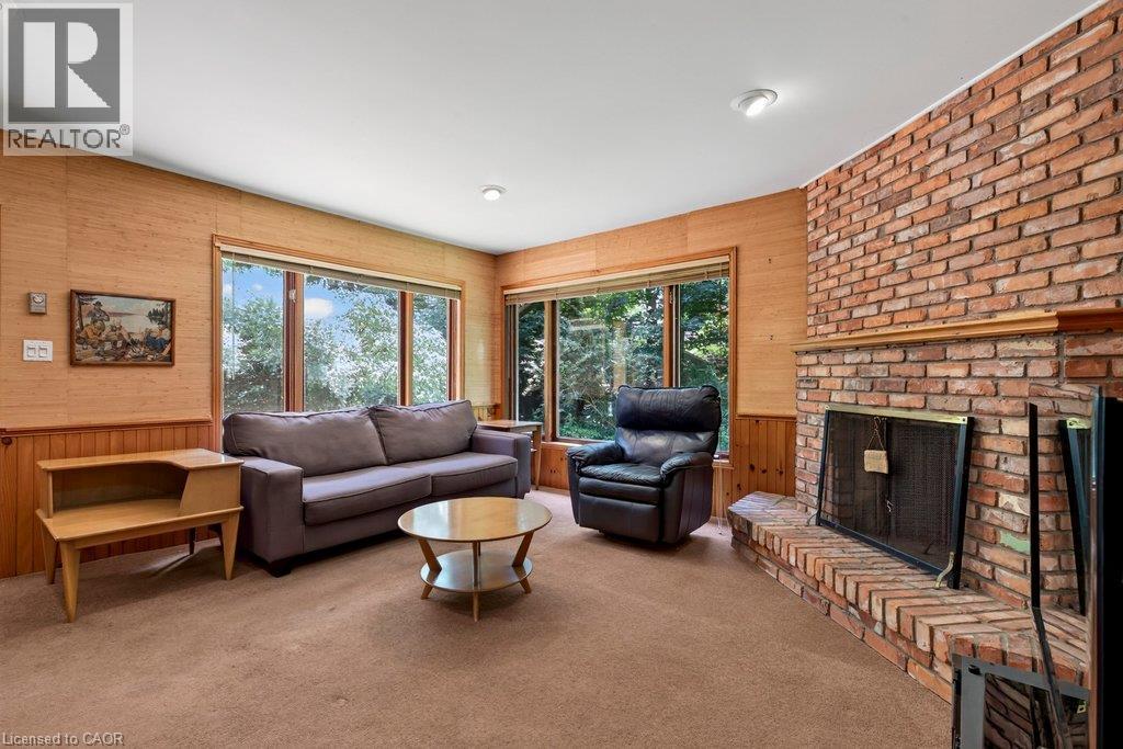 main level family room - 44 Colquhoun Crescent, Hamilton, ON - Indoor Photo Showing Living Room With Fireplace
