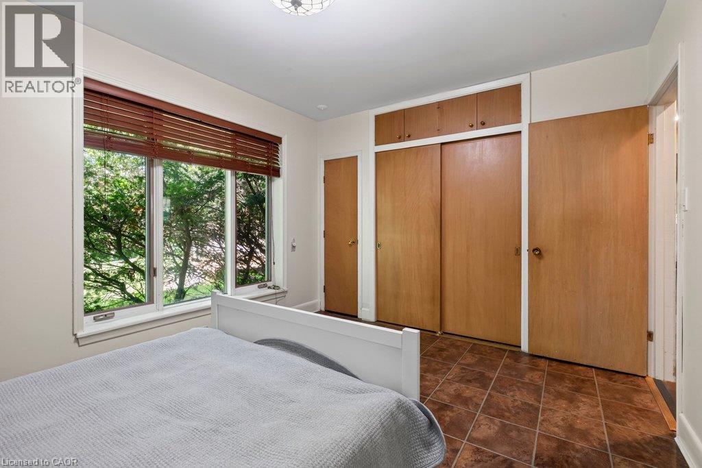 oversized closets with sliding doors - 44 Colquhoun Crescent, Hamilton, ON - Indoor Photo Showing Bedroom