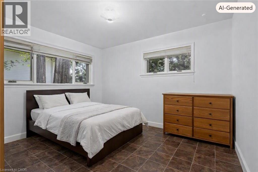 Virtually staged Bedroom featuring large tile flooring, a multi-pane window with blinds, a smaller single-pane window with blinds, and a ceiling-mounted light fixture - 44 Colquhoun Crescent, Hamilton, ON - Indoor Photo Showing Bedroom