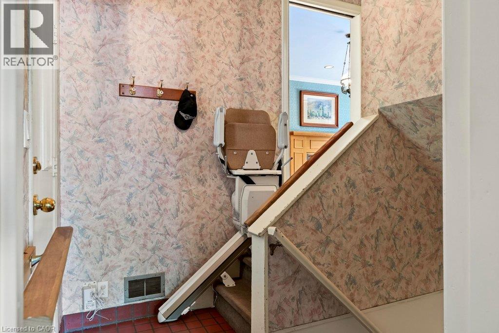 extra entrance at the front with chair lift - 44 Colquhoun Crescent, Hamilton, ON - Indoor Photo Showing Other Room