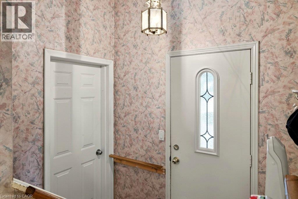 from this entrance go to main level or directly to the garage - 44 Colquhoun Crescent, Hamilton, ON - Indoor Photo Showing Other Room