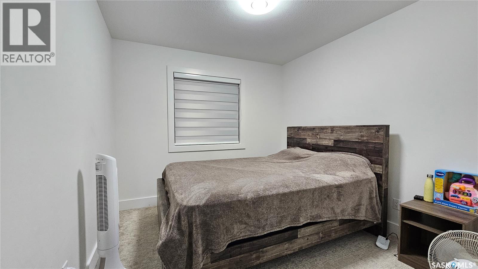 148 Rosewood Boulevard E, Saskatoon, SK - Indoor Photo Showing Bedroom