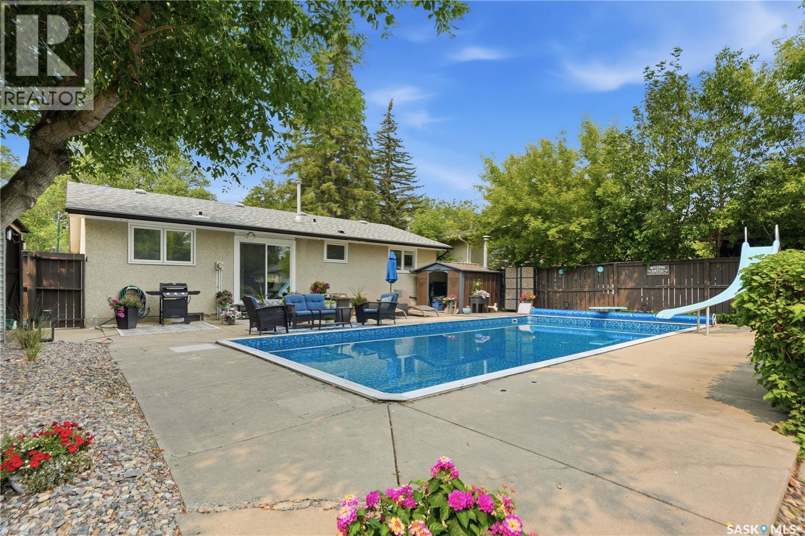116 Mcmaster Crescent, Saskatoon, SK - Outdoor With In Ground Pool