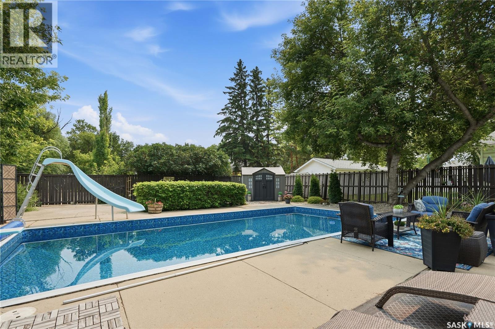 116 Mcmaster Crescent, Saskatoon, SK - Outdoor With In Ground Pool With Backyard