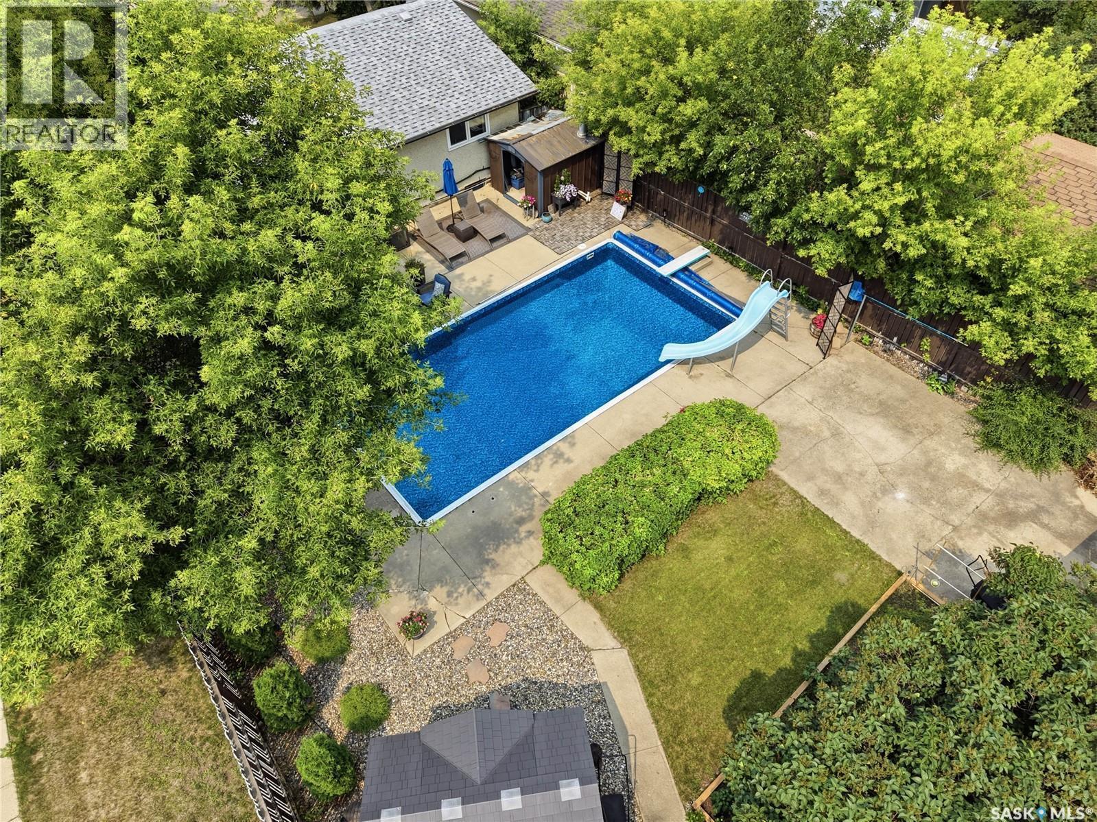 116 Mcmaster Crescent, Saskatoon, SK - Outdoor With In Ground Pool