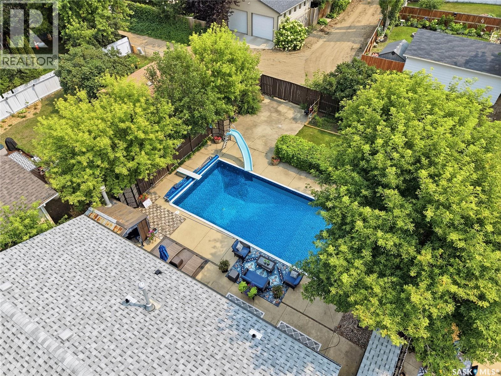 116 Mcmaster Crescent, Saskatoon, SK - Outdoor With In Ground Pool
