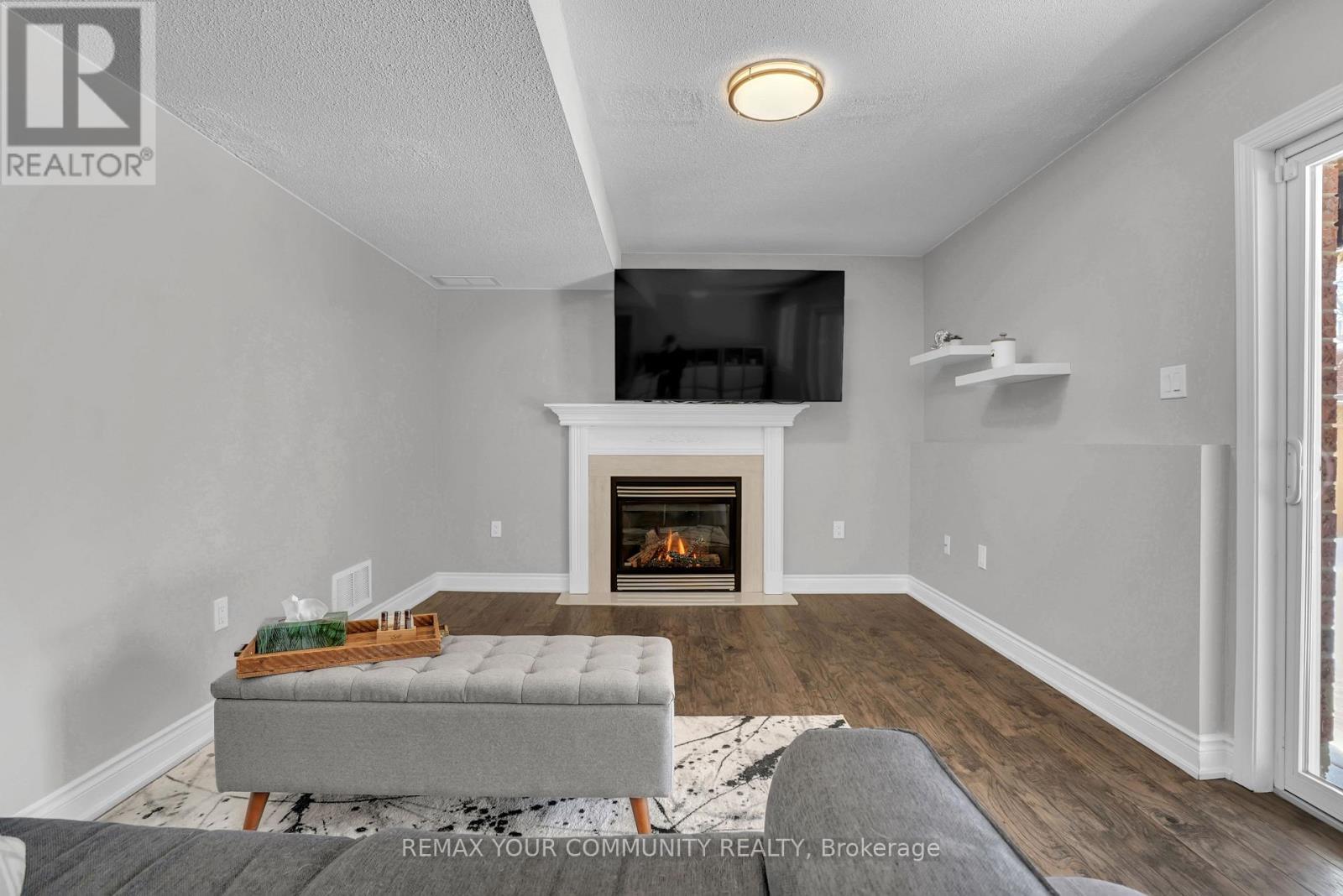 92 Sandringham Drive, Barrie, ON - Indoor Photo Showing Living Room With Fireplace