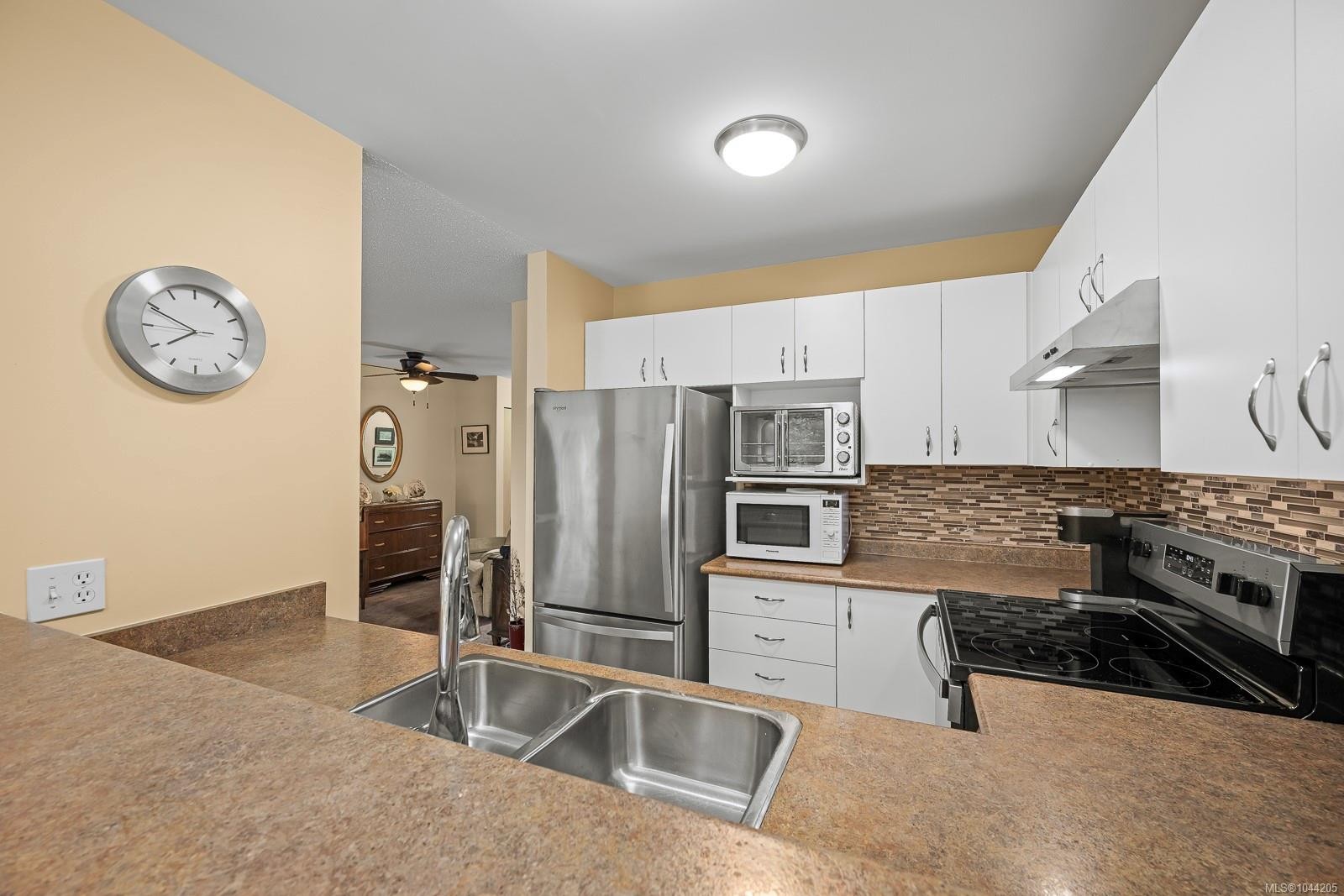 #203B-698 Aspen Rd, Comox, BC - Indoor Photo Showing Kitchen With Double Sink
