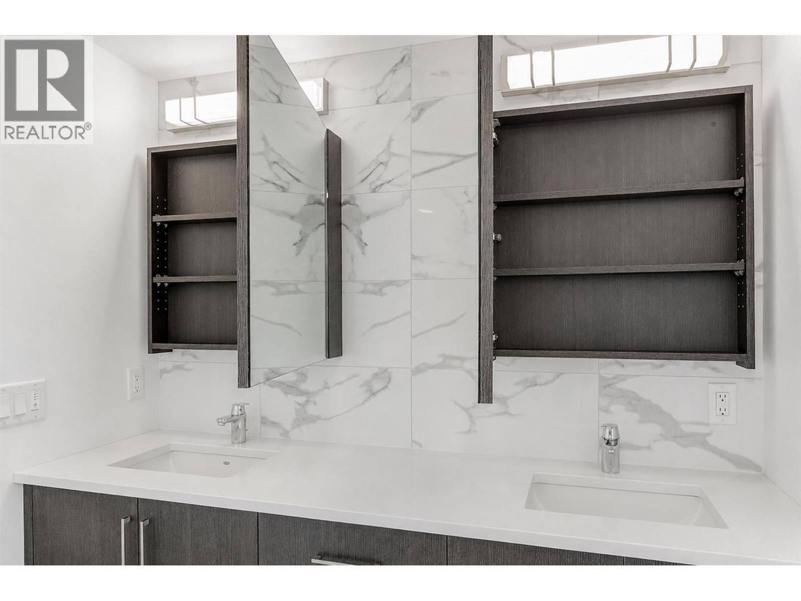ample storage - 1588 Ellis Street Unit# 1501, Kelowna, BC - Photo Showing Bathroom